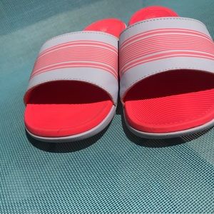 Champion Sliders.  Super cool and comfy. Barely worn